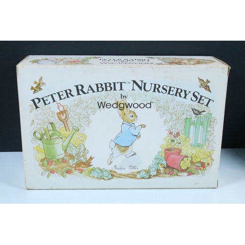 59 - Border Fine Arts figurines 'Peter Rabbit in the watering can', 'Peter in wheelbarrow' and 'Simpkin h... 