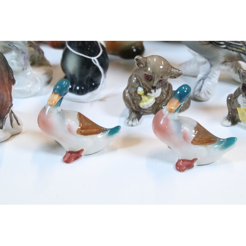 75 - Group of 20th century assorted ceramic animal and bird figurines to include Beswick and Goebel examp... 