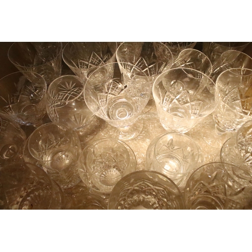 64 - Large collection of glassware to include red and white wine glasses, champagne flutes, tumblers, bra... 