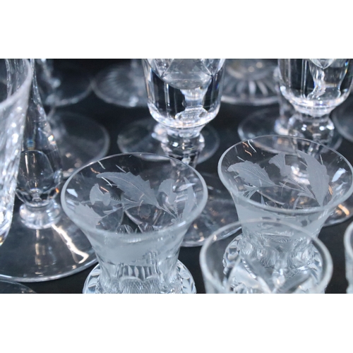 64 - Large collection of glassware to include red and white wine glasses, champagne flutes, tumblers, bra... 