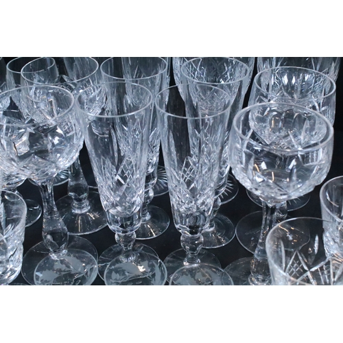 64 - Large collection of glassware to include red and white wine glasses, champagne flutes, tumblers, bra... 
