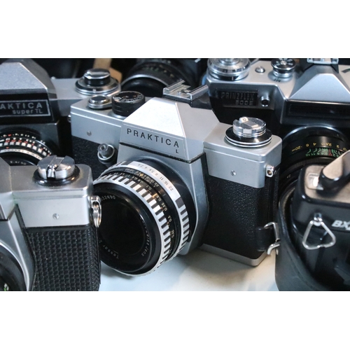 364 - Collection of analogue cameras to include mostly Soviet film era 35mm SLR examples, lenses and acces... 
