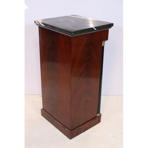 561 - Pair of 20th century mahogany pedestal bedside cabinets, in the Biedermier style, having marble tops... 