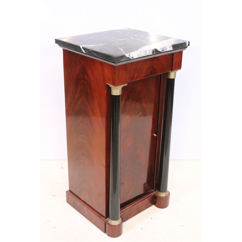 561 - Pair of 20th century mahogany pedestal bedside cabinets, in the Biedermier style, having marble tops... 