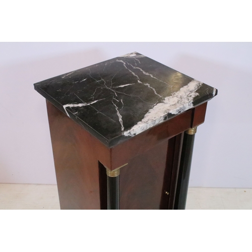 561 - Pair of 20th century mahogany pedestal bedside cabinets, in the Biedermier style, having marble tops... 