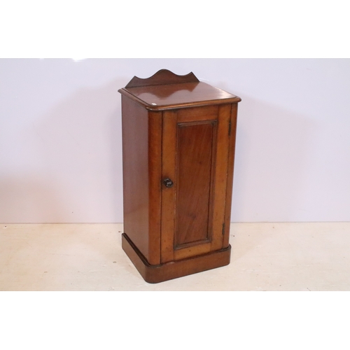 562 - 19th century mahogany pot cupboard, or bedside cabinet, having shaped back gallery, the door enclosi... 