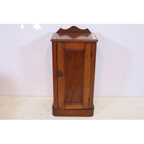 562 - 19th century mahogany pot cupboard, or bedside cabinet, having shaped back gallery, the door enclosi... 