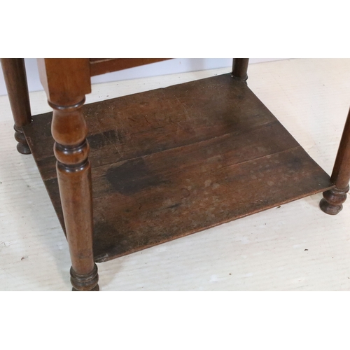 567 - 19th century mahogany two tier occasional table with single drawer on turned legs, 66cm high x 67.5c... 