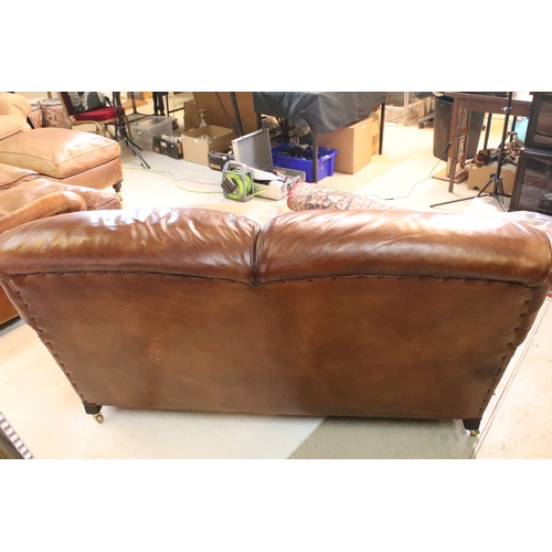 637 - 20th century leather three-piece suite, originally purchased from Leather Chairs of Bath, comprising... 