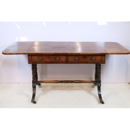 581 - 19th century mahogany sofa table, having cross-banded top with two frieze drawers and two dummy to t... 