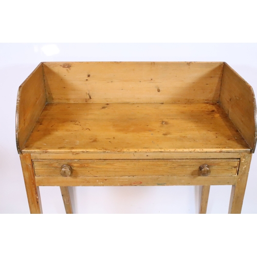 583 - Victorian pine wash-stand, having three-quarter galleried back over two frieze drawers, raised on sq... 