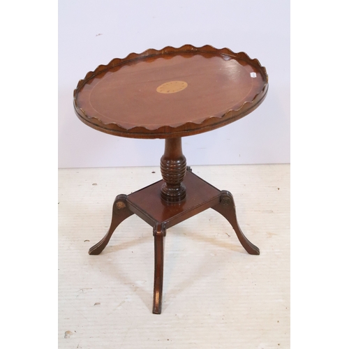 584 - 19th century mahogany side table, having square top on open shelf and shaped X-stretcher, raised on ... 