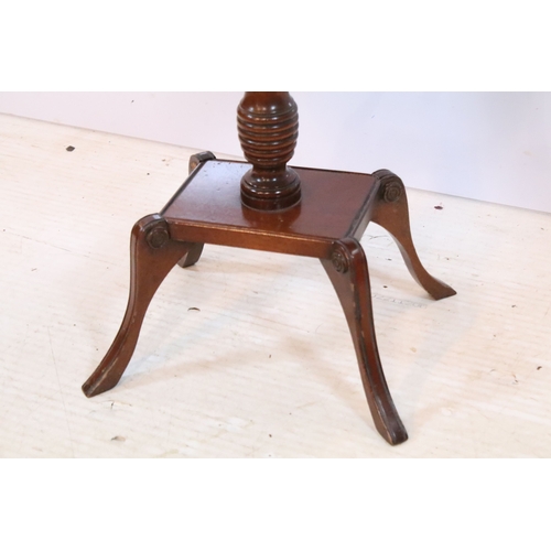584 - 19th century mahogany side table, having square top on open shelf and shaped X-stretcher, raised on ... 
