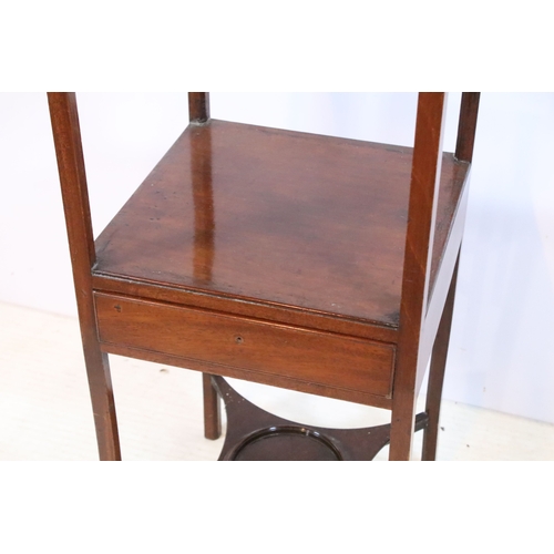 584 - 19th century mahogany side table, having square top on open shelf and shaped X-stretcher, raised on ... 