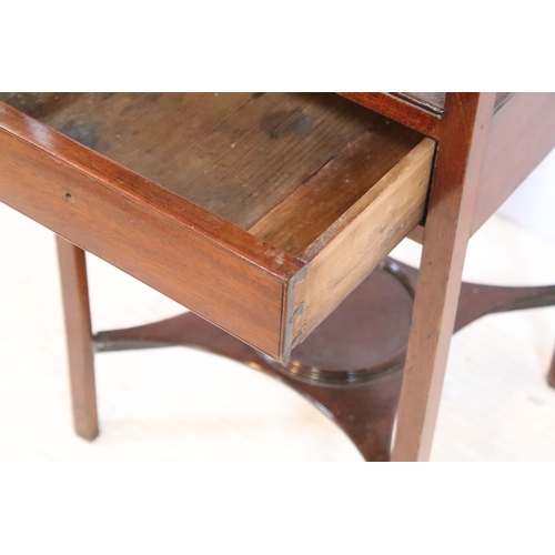 584 - 19th century mahogany side table, having square top on open shelf and shaped X-stretcher, raised on ... 