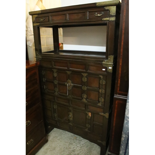 605 - Late 19th/early 20th century elm and brass mounted chest, probably Korean, having detachable top whi... 