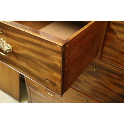 607 - 19th century figured mahogany chest of drawers, having two short on three long drawers, raised on sq... 