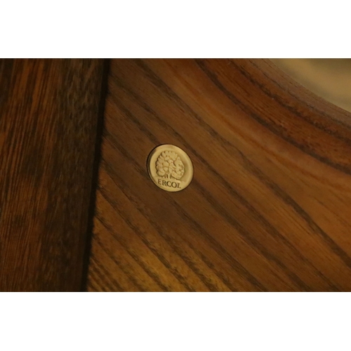 616 - Ercol pedestal extending dining table, having oval top with baluster stem base and swept legs, 110cm... 