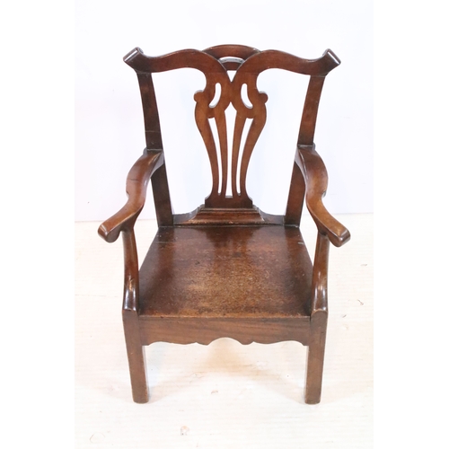 336 - Mahogany child's elbow chair with pierced back splat,  H 61cm, W 37cm, D 28cm