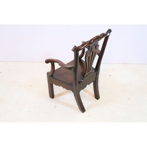 336 - Mahogany child's elbow chair with pierced back splat,  H 61cm, W 37cm, D 28cm
