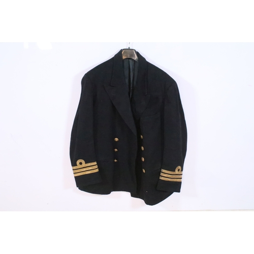 339 - Naval officers uniform jacket together with two caps and an assortment of military buttons