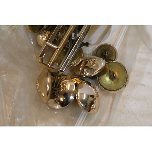 339 - Naval officers uniform jacket together with two caps and an assortment of military buttons