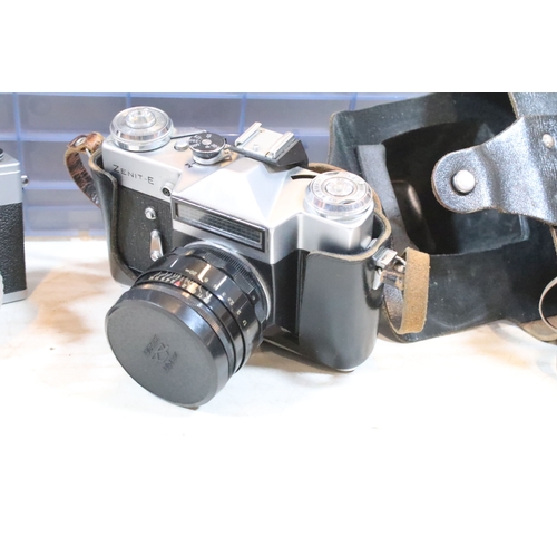 364 - Collection of analogue cameras to include mostly Soviet film era 35mm SLR examples, lenses and acces... 