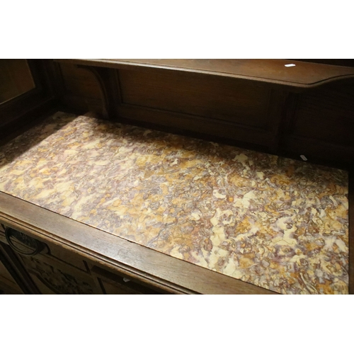 617 - Early 20th century oak chiffonier, having large mirror back with bevelled arched plate enclosed with... 