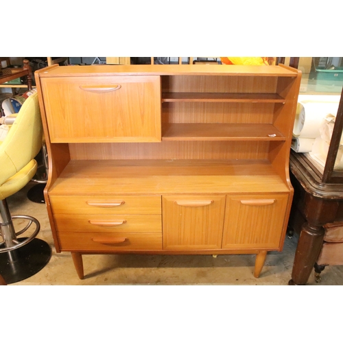 639 - Mid 20th century teak veneered sideboard, having a high back with cupboard upon three drawers, W 129... 