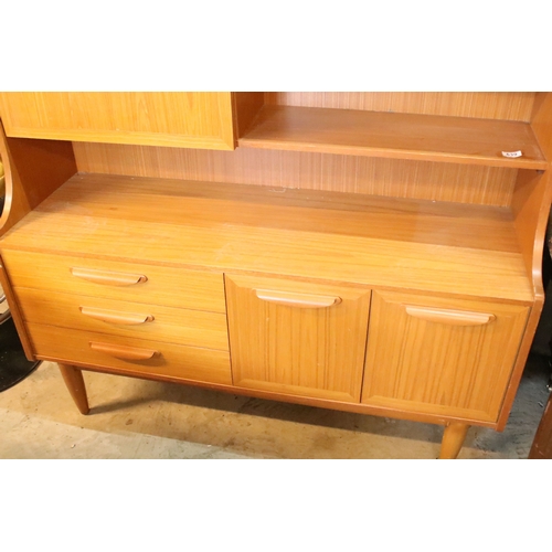 639 - Mid 20th century teak veneered sideboard, having a high back with cupboard upon three drawers, W 129... 