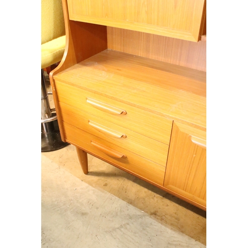639 - Mid 20th century teak veneered sideboard, having a high back with cupboard upon three drawers, W 129... 