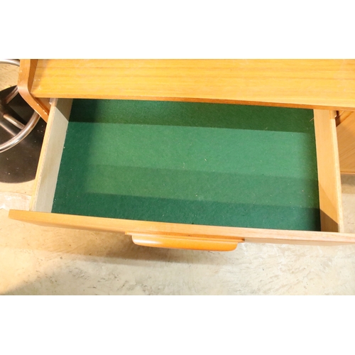 639 - Mid 20th century teak veneered sideboard, having a high back with cupboard upon three drawers, W 129... 