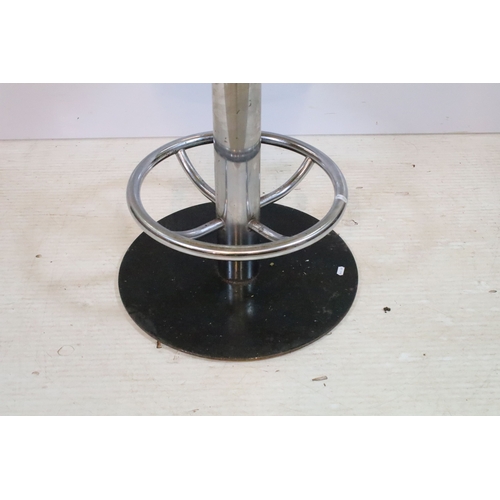 642 - Pair of 20th century egg stools, having yellow buttoned upholstery, raised on chromed stem with foot... 