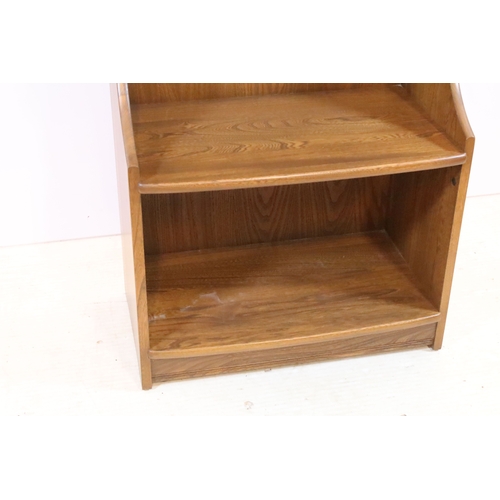 643 - Ercol 'Golden Dawn' open bookcase, having four open shelves, W 60cm x D 36cm x H 112cm