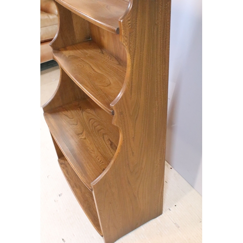 643 - Ercol 'Golden Dawn' open bookcase, having four open shelves, W 60cm x D 36cm x H 112cm