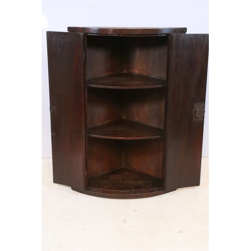 667 - 19th century mahogany bow fronted corner cupboard, having inlaid doors, W 55cm x H 92cm