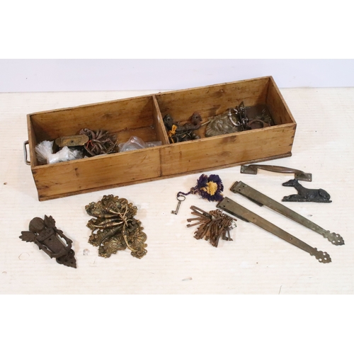 373 - Collection of 19th century sets of brass drawer handles, brass and iron door knockers, keys, locks e... 