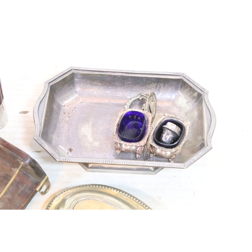 383 - Collection of silver plate, to comprise a pair of candlesticks, hip flasks, trophies, jugs, etc. tog... 