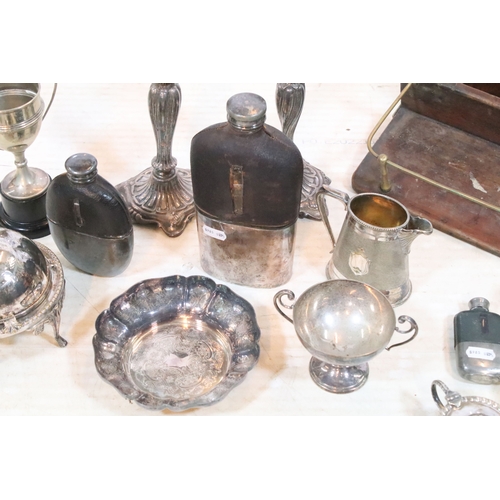 383 - Collection of silver plate, to comprise a pair of candlesticks, hip flasks, trophies, jugs, etc. tog... 