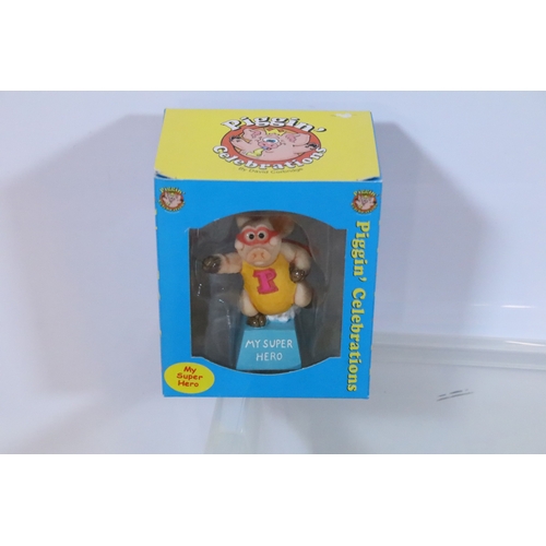 386 - Collection of boxed Piggin' figures, to comprise My Valentine, My Super Hero, Piggin Presents, Piggi... 