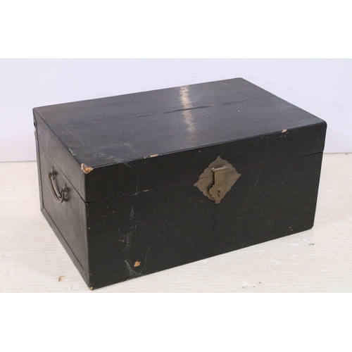 387 - Antique Chinese lacquered box, having central brass locking fixture, with brass carry handles, W 62c... 