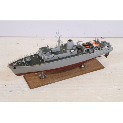 388 - Model ship replica of the Royal Navy Hunt, raised on wooden plinth, L 60cm x H 29cm (approx.)