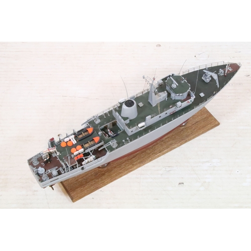 388 - Model ship replica of the Royal Navy Hunt, raised on wooden plinth, L 60cm x H 29cm (approx.)