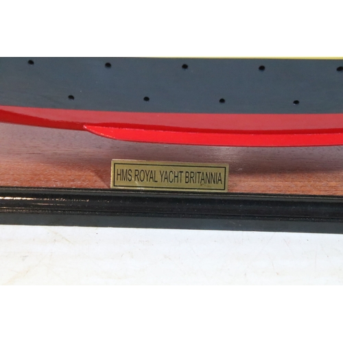 389 - Model ship replica of HMS Royal Yacht Britannia raised on wooden plinth, L 72cm x H 32cm (approx.)