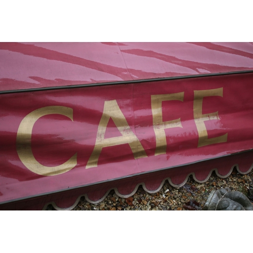 537 - Folding shop front canopy in burgundy with 'Cafe' inscription to front, L 250, D 100cm
