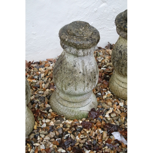 539 - Group of six reconstituted stone decorative bollards of stepped circular form, approx. H 41cm