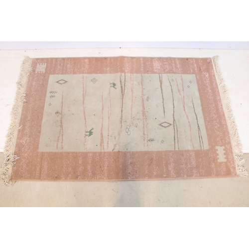 556 - Mahyar pink ground rug, having thick pink border, 98cm x 154cm (approx)