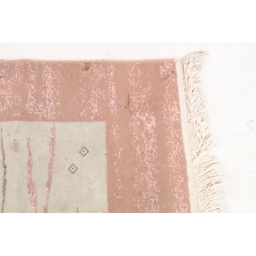 556 - Mahyar pink ground rug, having thick pink border, 98cm x 154cm (approx)