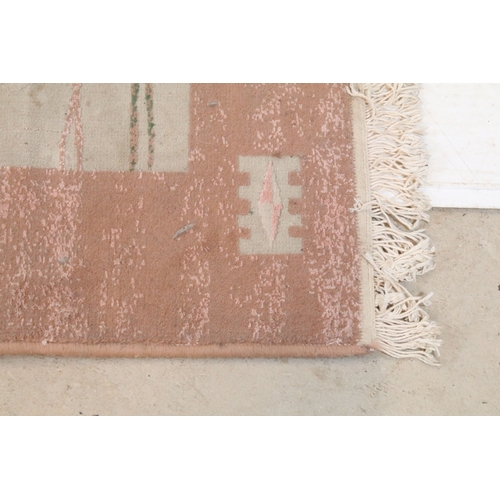 556 - Mahyar pink ground rug, having thick pink border, 98cm x 154cm (approx)