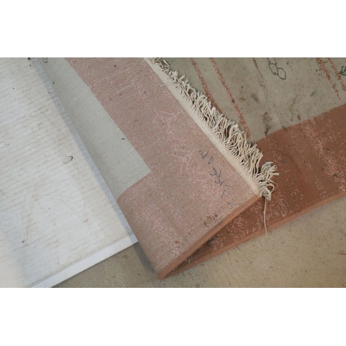 556 - Mahyar pink ground rug, having thick pink border, 98cm x 154cm (approx)